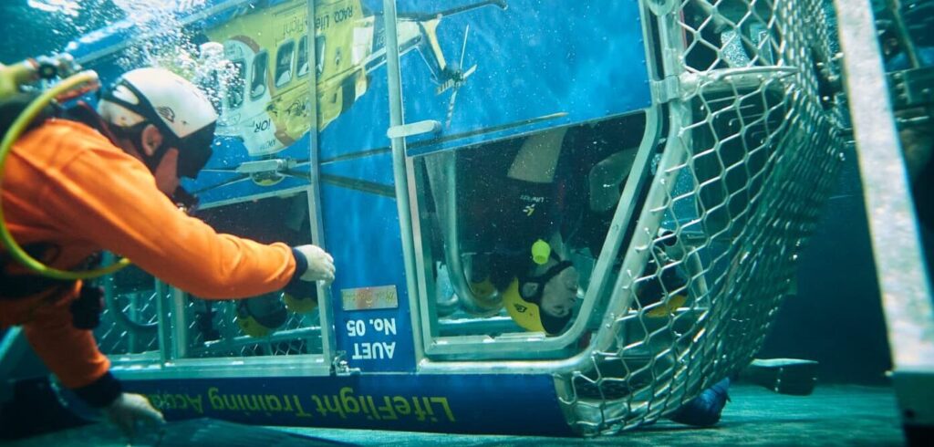 Person under water during HUET training