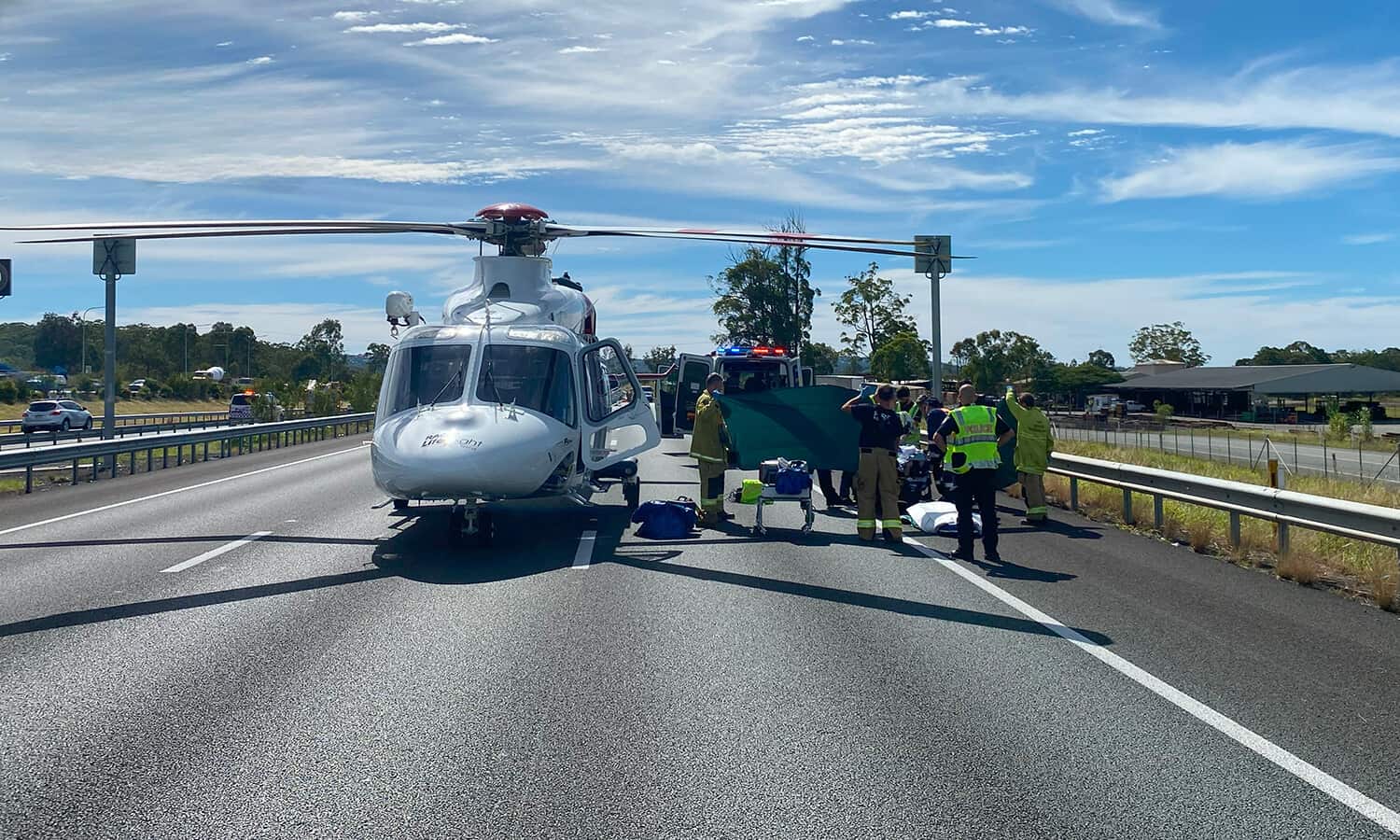 High-Quality Motorbike Rider Seriously Injured In Crash With Truck As Traffic Madness Ensues On Mitchell Freeway Design Illustration High-Quality Motorbike Rider Seriously Injured In Crash With Truck As Traffic Madness Ensues On Mitchell Freeway Design Illustration